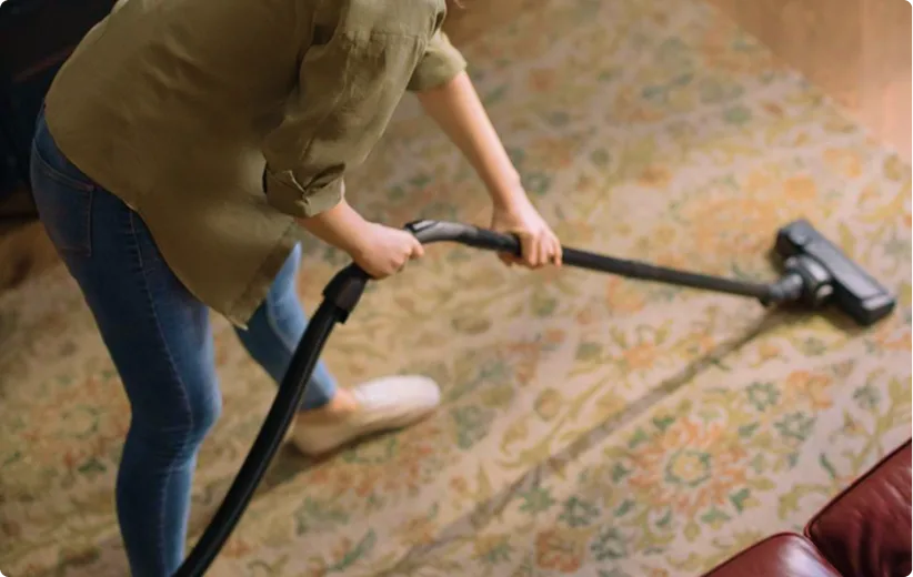 vacuuming hand knotted rugs